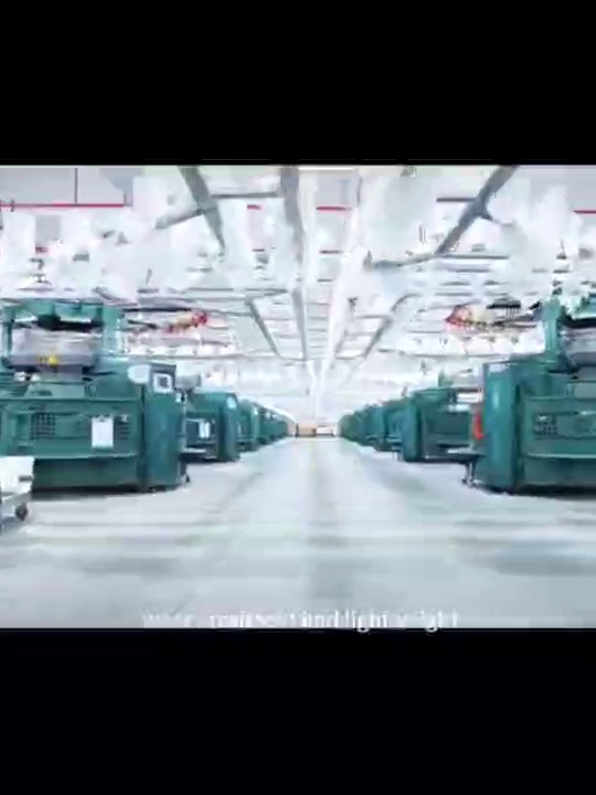 Warp-knitting production hall — rows of machines